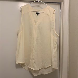 V-neck cream blouse